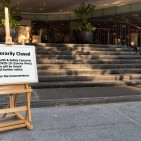 Bangkok, Thailand - April 17, 2020 : restaurant, hotel, company, shopping center closed due to coronavirus or covid-19 pandemic outbreak lockdown. coronavirus news temporarily closed board in front of building after government shutdown