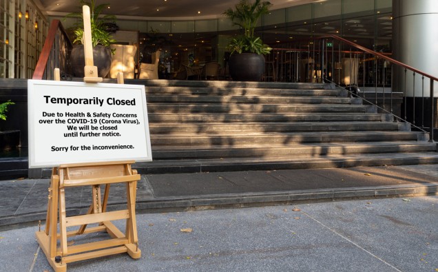 Bangkok, Thailand - April 17, 2020 : restaurant, hotel, company, shopping center closed due to coronavirus or covid-19 pandemic outbreak lockdown. coronavirus news temporarily closed board in front of building after government shutdown