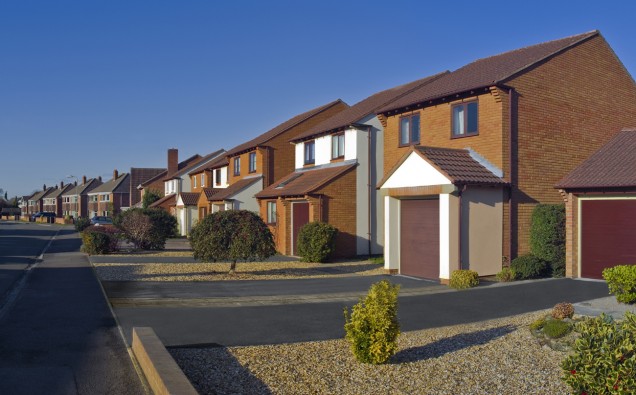 Cookie cutter houses in a row along a street