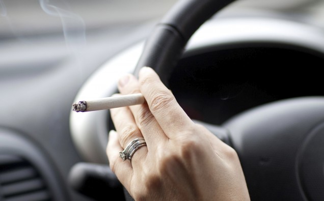 Driver smoking a cigarette