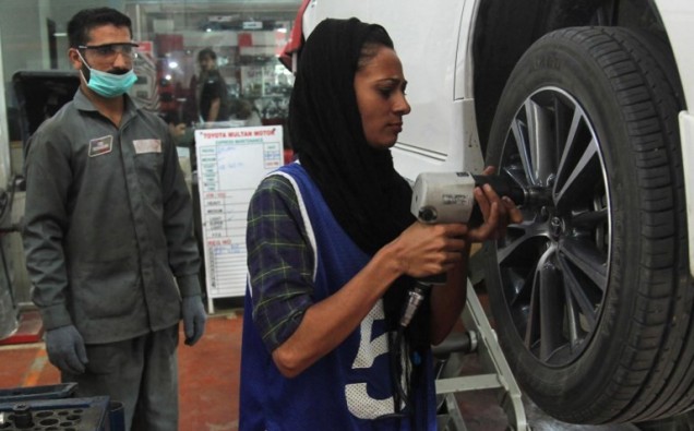 Female car mechanic in patriarchal Pakistan image