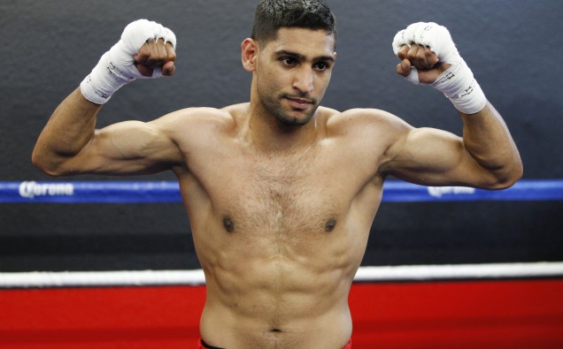 British boxer Amir Khan poses during a media opportunity at Ponce De Leon Boxing Club in Montebello