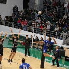 Lebanese League-Naseer (in blue) about to execute a  powerful smash