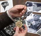 RWB_Auctions_Valuer_Edd_Thomas_Examines_Negatives_From_An_Unpublished_Muhammed_Ali_Advert.jpg_resized_220_