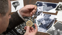 RWB_Auctions_Valuer_Edd_Thomas_Examines_Negatives_From_An_Unpublished_Muhammed_Ali_Advert.jpg_resized_220_