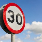 A British road sign for a 30 mile per hour speed limit area.