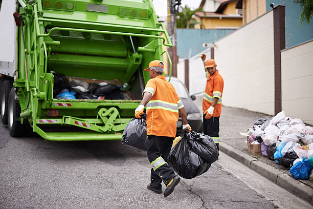 Cropped shot of a garbage collection team at work