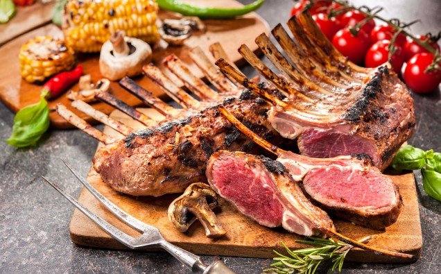 Grilled Rack of lamb on a cutting board