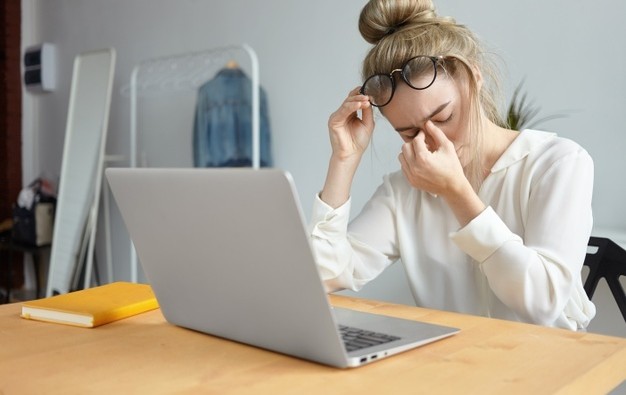 modern-technology-job-people-concept-portrait-tired-young-female-employee-with-hair-bun-taking-off-eyeglasses-massaging-her-nose-bridge-feeling-stressed-because-lot-work_343059-3052