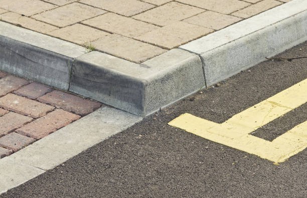 Tiled walkway in England, with double-yellow lines