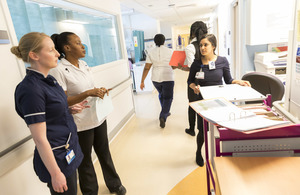 s300_nurses_and_doctor_chatting_in_hospital_corridor_at_uclh