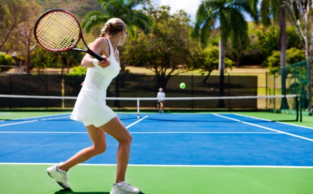 people playing tennis in tropics