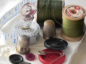 thread needle tape buttons